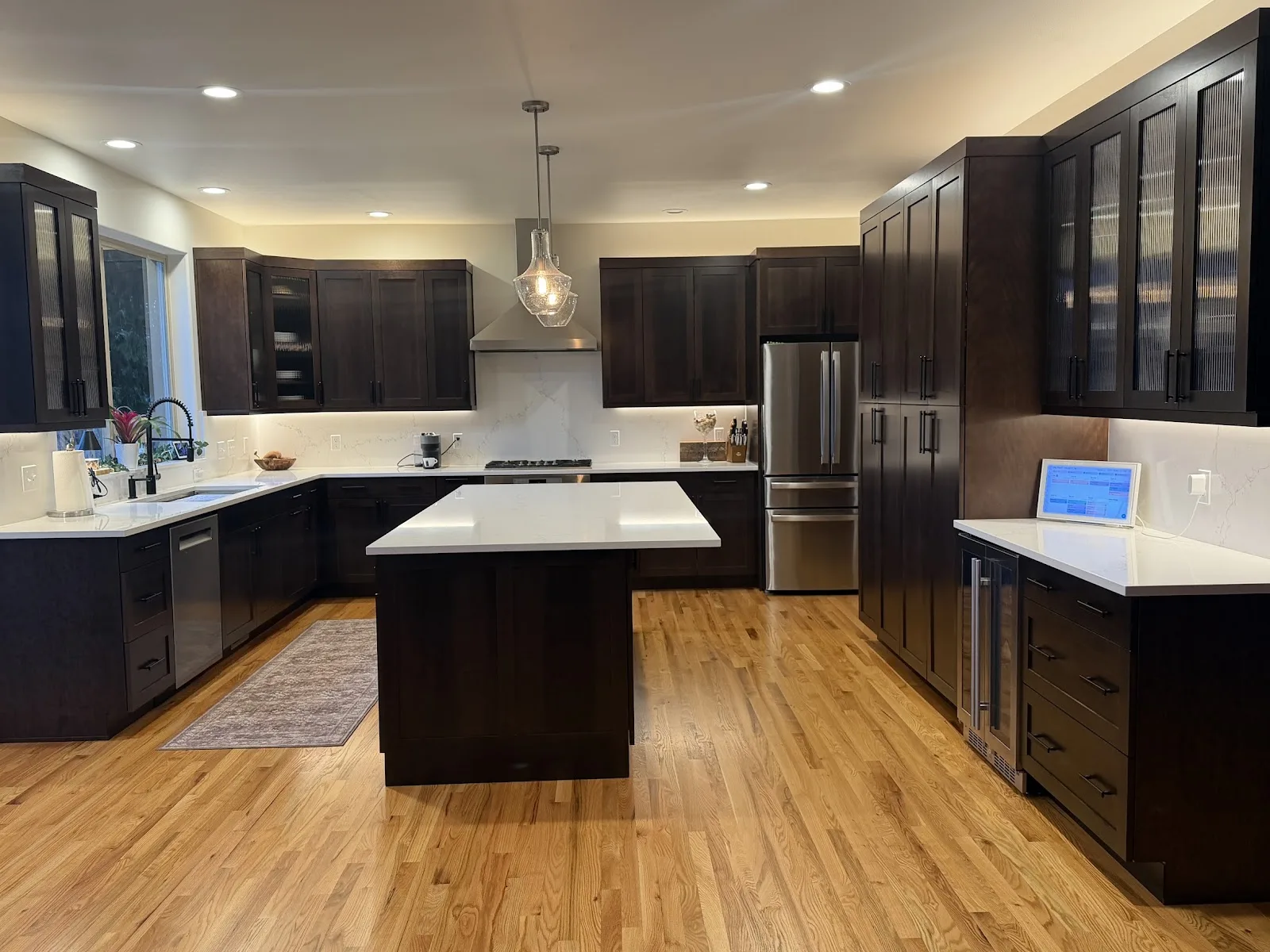 Cherry kitchen with a quartz island in Bellingham, WA