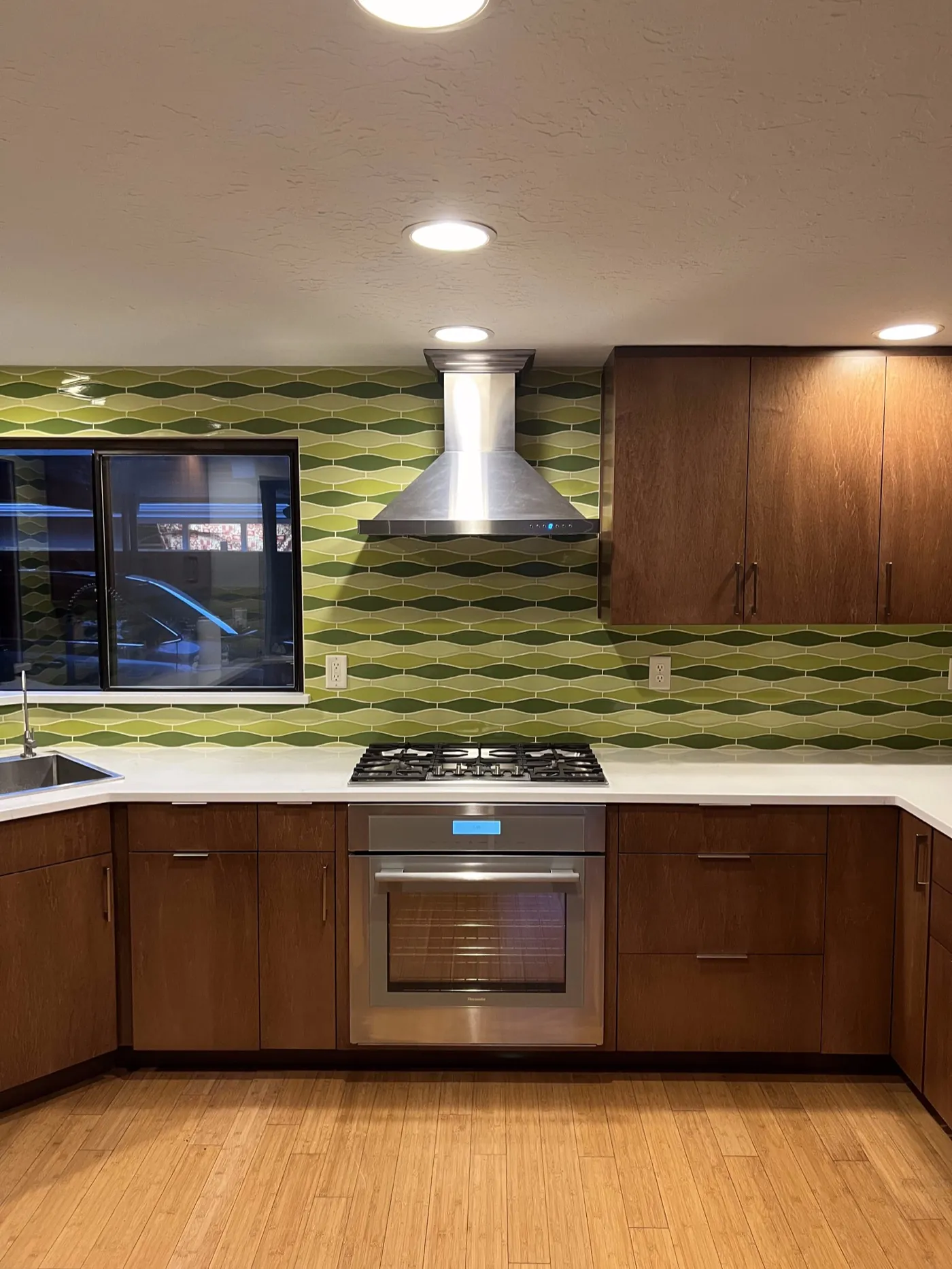 Kitchen remodel with wood cabinets and a window view in Bellingham, WA