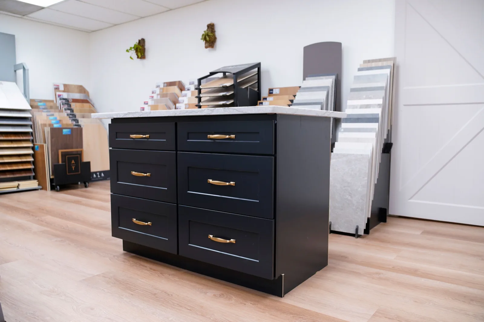 Cabinet displays and a sample island at the Living By Design showroom in Bellingham, WA